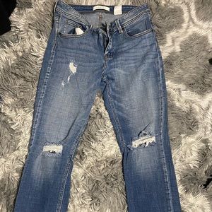 Mid Rise light washed denim jeans